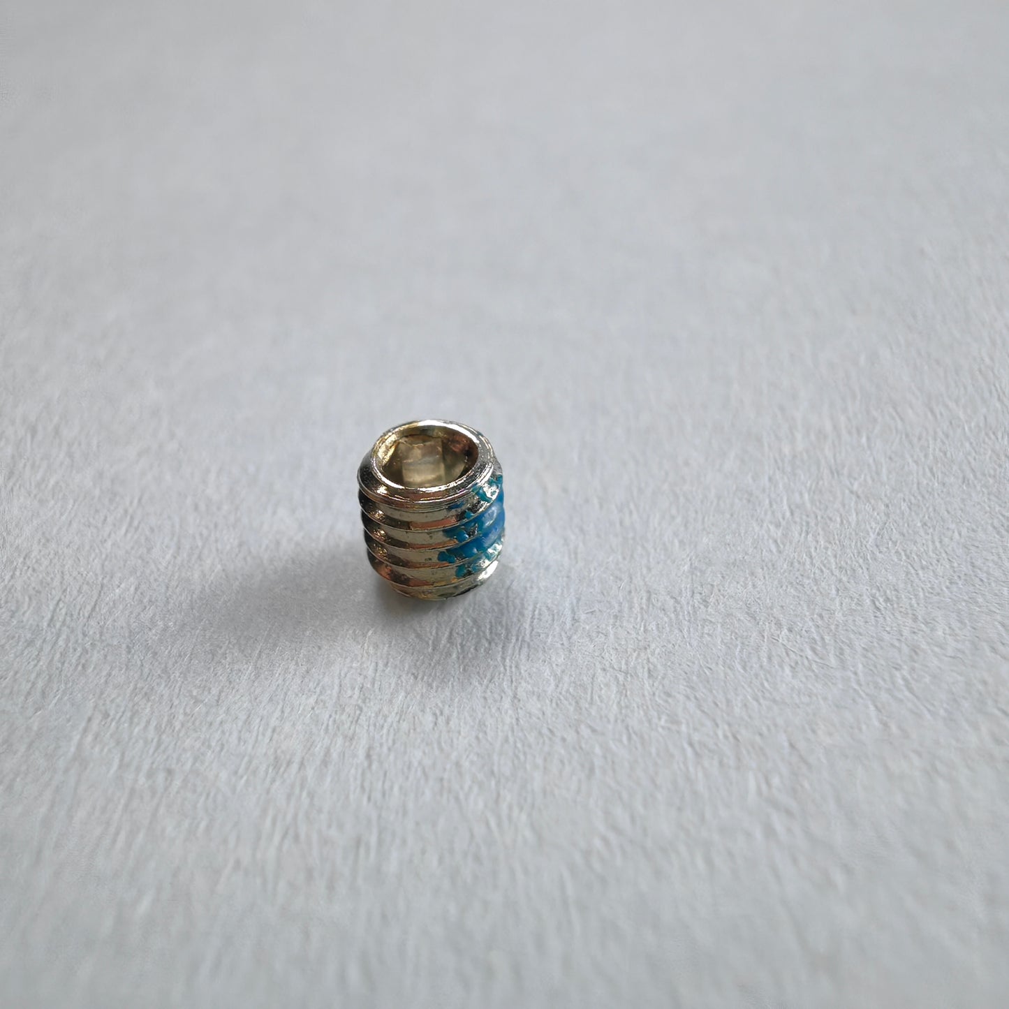 J100 Spreader Set Screw